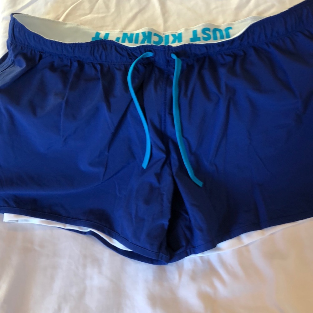 NWT Nike running shorts with fitted shorts lining